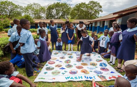 WorldVision-Ngonga-on-Story-Mat