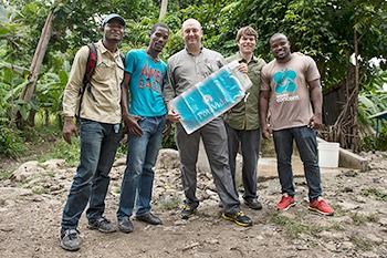 PotaVida_World Concern field staff in Haiti with Tyler and Charlie