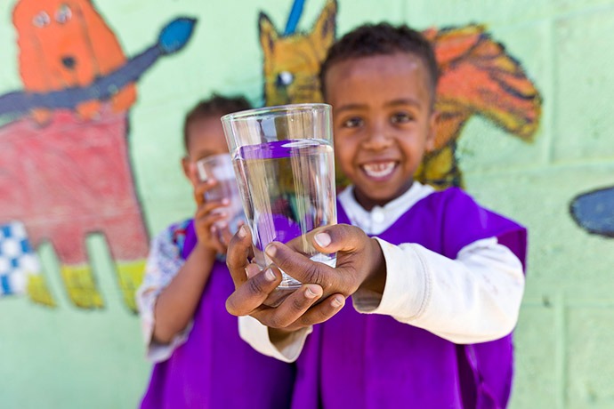 Children with glass of water