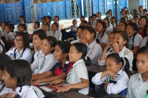 Young women react to an interactive presentation about menstrual health at Adarsha Kanya School in Lalitpur District, Nepal, on Menstrual Hygiene Day, May 28, 2017. (Credit: Splash)