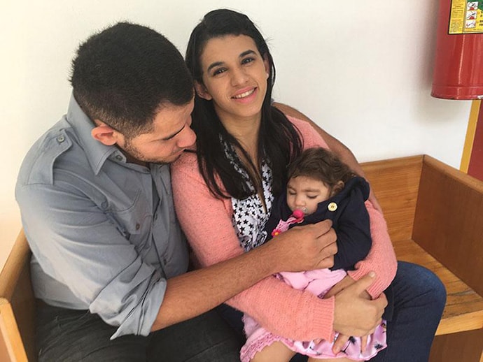 Maria Carolina Silva Flor and Joselito Alves dos Santos with their 18-month-old daughter