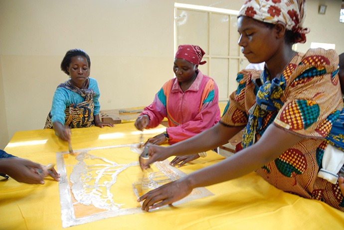 Women artisans working at table