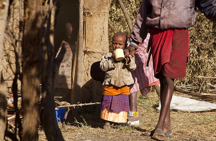 Tanzanian child drinking water