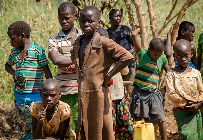 African children in line for water