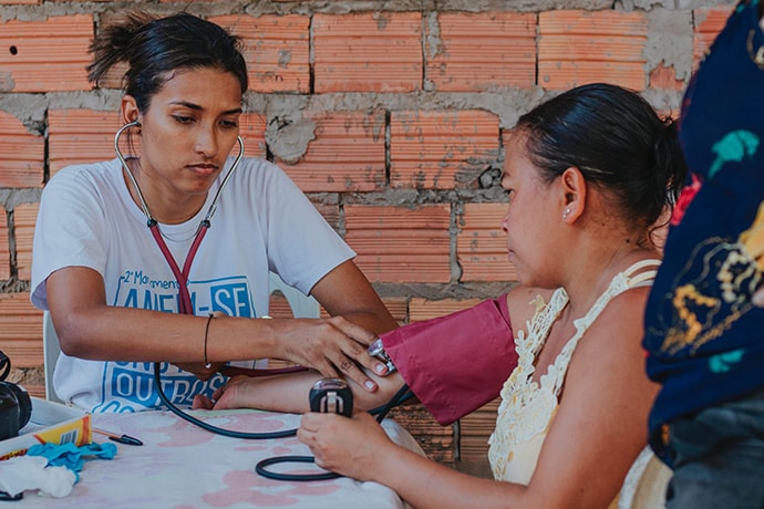 Community health worker with patient