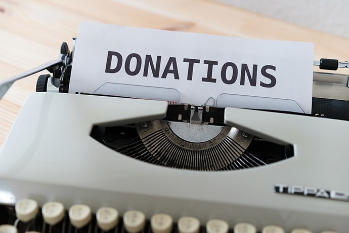 Typewriter typed out “Donations”