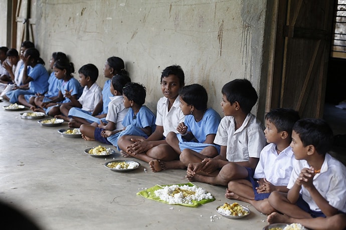 Indian children having a meal