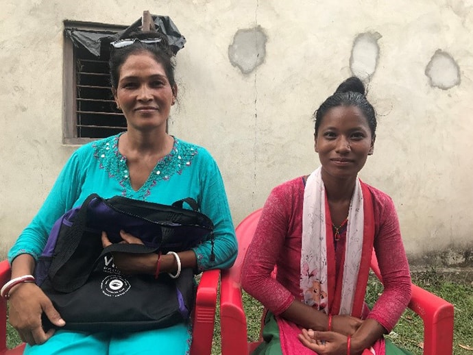 Meena (right) with the Community Health Worker