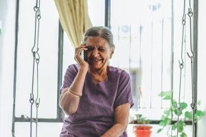 Elderly woman smiling, India