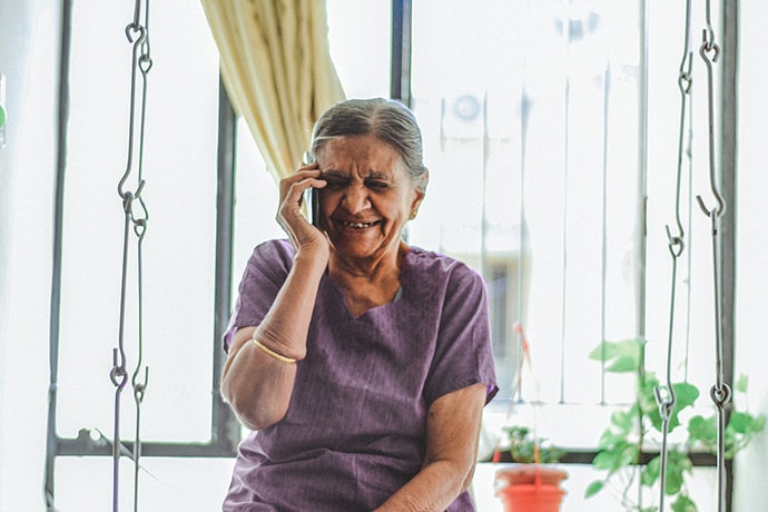 Elderly woman smiling, India