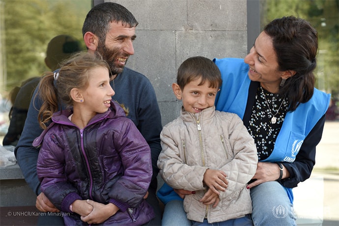 Aid worker with family