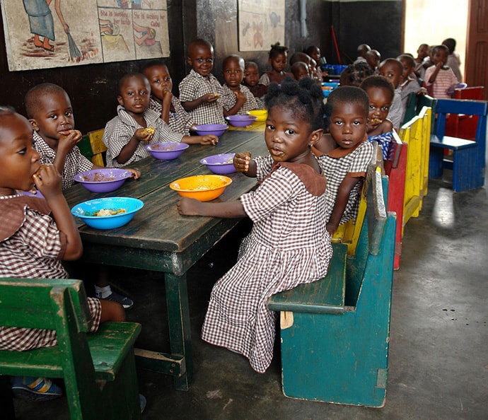 School children eating a meal