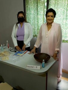 Meera with doctor pose for photo