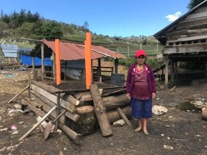 Toribia standing outside at farm