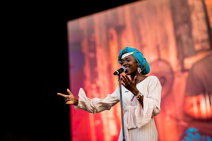 View of Slam Poet and UNHCR Goodwill Ambassador Emi Mahmoud performing