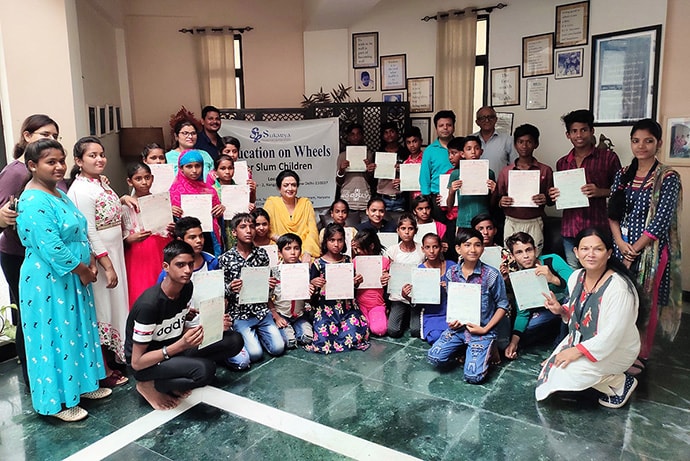 Group photo of students holding certificates