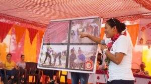 Photo of Nirmala Chaudhary speaking to group