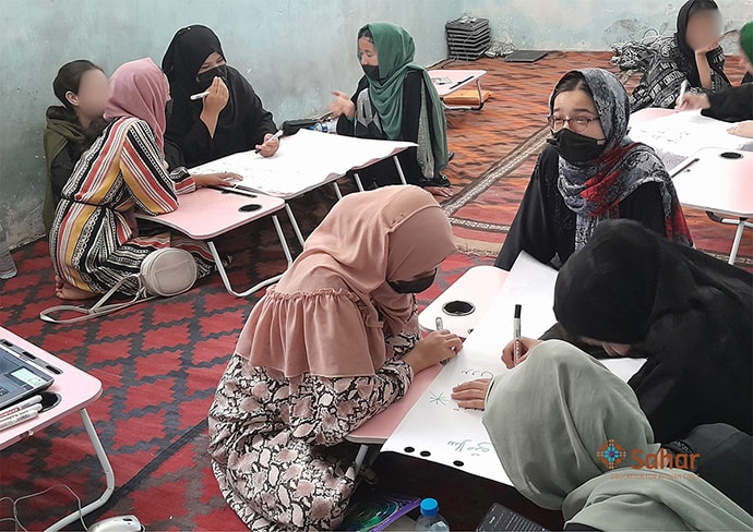 View of students working at desks