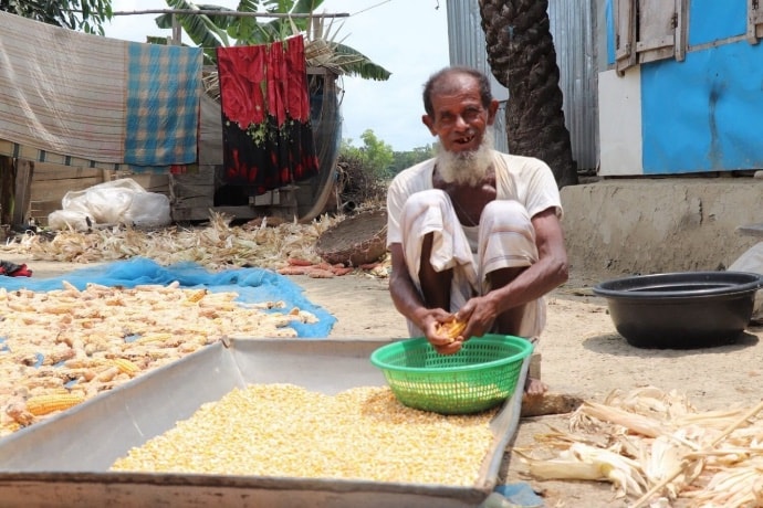 Photo of Shajahan with crops