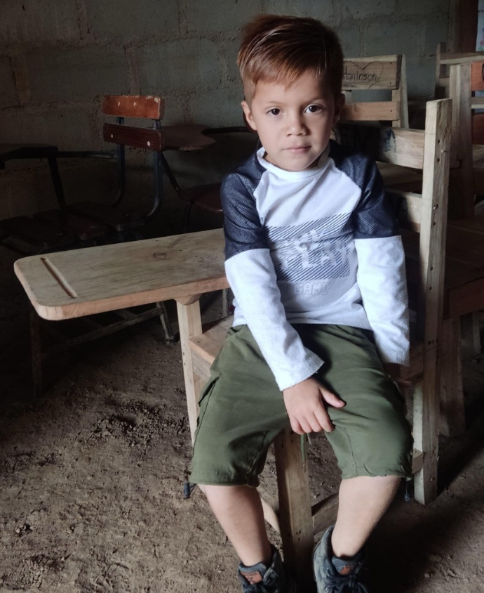 Photo of student sitting at desk