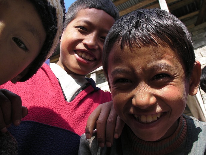 Photo of 3 smiling children