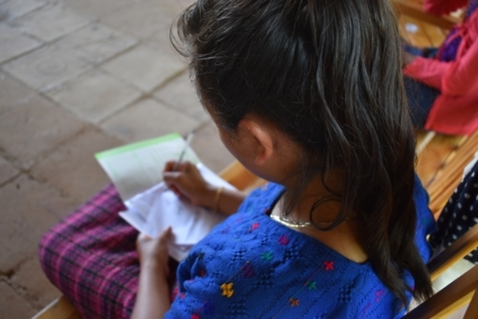 View of child writing