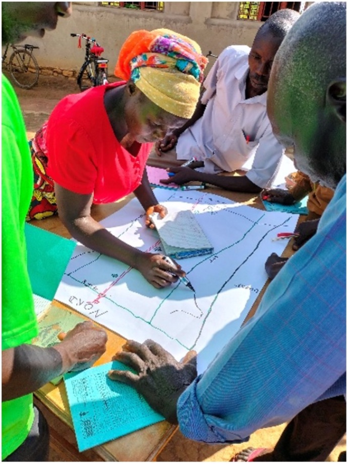 View of woman working on map