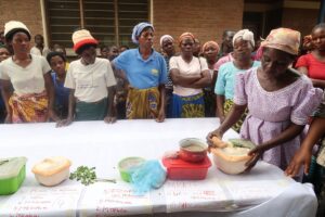 View of group watching a cooking demonstration