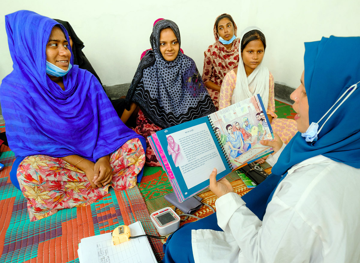 Group photo of women in session