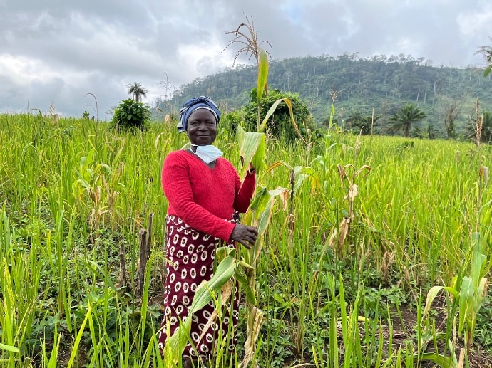 A woman posing in field